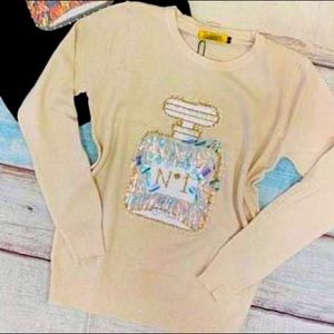 Hermoso suéter de dama talla m y l